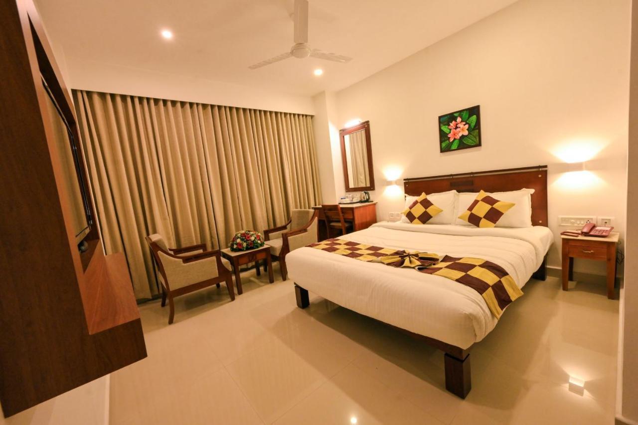 Hotel Kabani International Muvattupuzha Екстер'єр фото