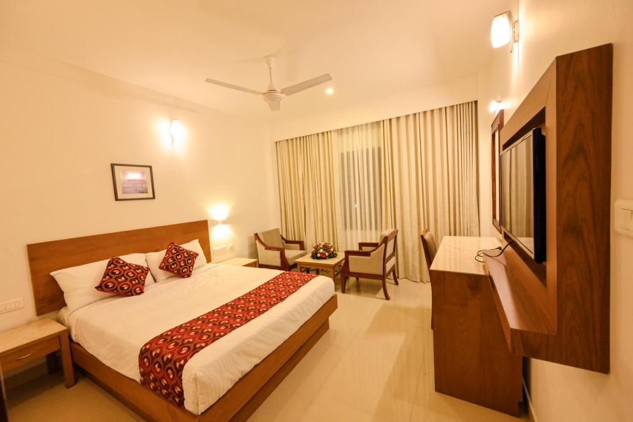 Hotel Kabani International Muvattupuzha Екстер'єр фото